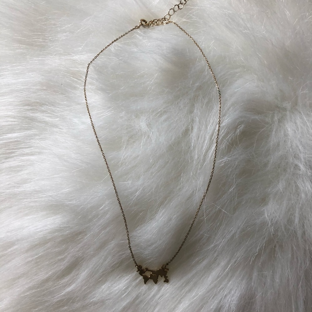 GOLD H&M WORLD MAP NECKLACE